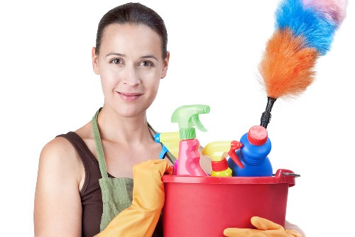 Professional carpets cleaner in W2 restoring a fresh living room carpet