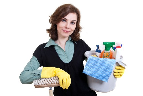 Cleaning team managing liability and safety procedures during service
